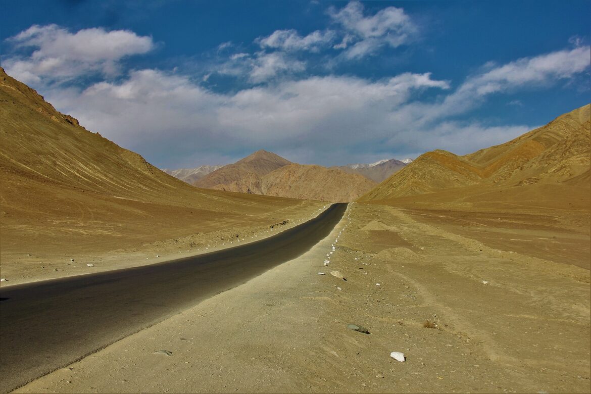 Magnetic Hill Ladakh yellow box on Leh Kargil highway with car